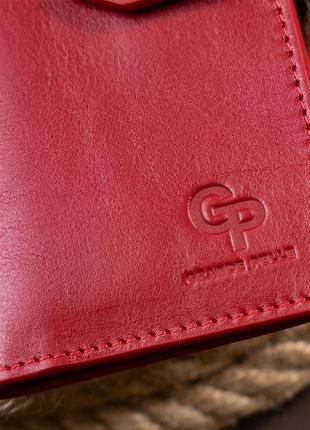 Вертикальный женский бумажник глянцевый anet на кнопке grande pelle 11325 красный8 фото