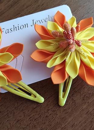 Заколки, резинки з квітами