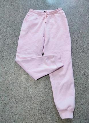 Розовые спортивные штаны на флисе