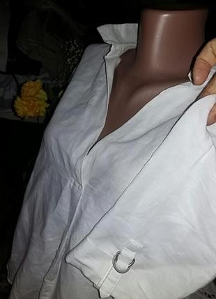 Льняна оригінальна блузка від відомого бренду.3 фото