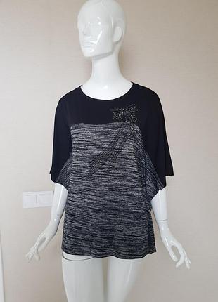 Гарна оригінальна трикотажна блуза
