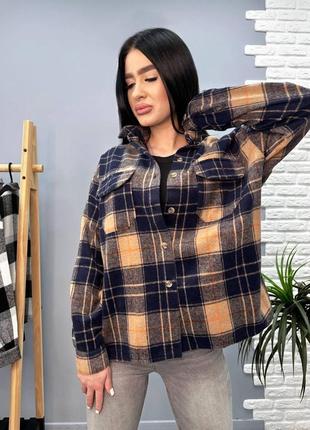Жіноча тепла картата сорочка 46-48. синій із коричневим