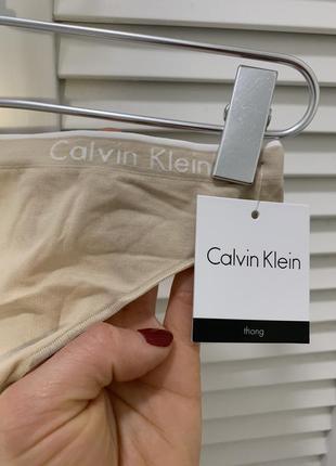 Бесшовные трусики-стринги от calvin klein2 фото