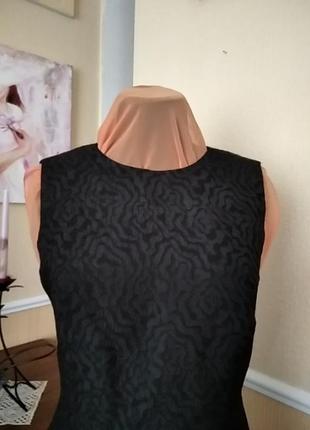 Маленькое черное платье с открытой спиной  на подкладке.3 фото