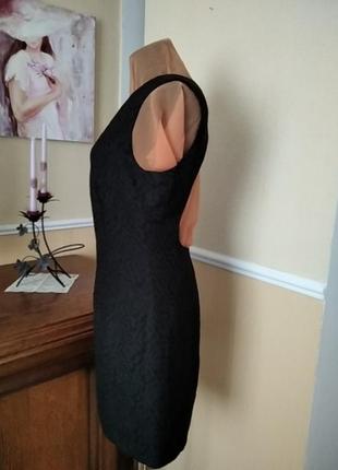 Маленькое черное платье с открытой спиной  на подкладке.4 фото