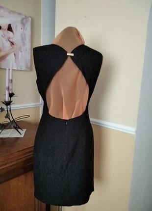 Маленькое черное платье с открытой спиной  на подкладке.5 фото