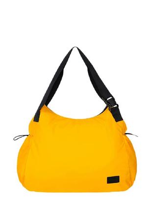 Яскрава стильна жіноча сумка в спортивному стилі. сумка на плече