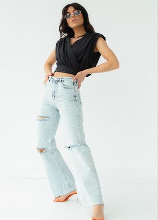Широкие джинсы с прорезями3 фото
