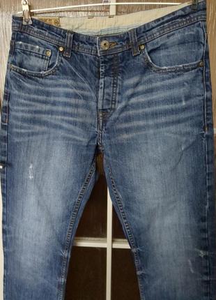 Стильные джинсы от известного бренда.2 фото