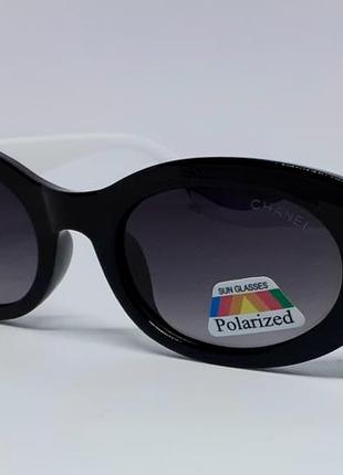Жіночі в стилі chanel сонцезахисні окуляри овальні чорні з білими дужками поляризовані