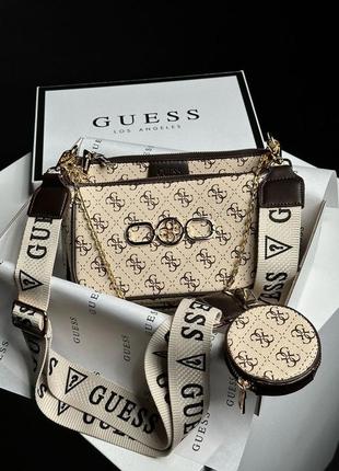 Женская стильная бежевая сумка guess тренд сезона