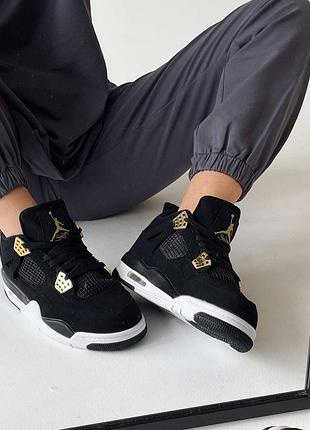 Крутейшие женские унисекс кроссовки nike air jordan 13 VARSITY lucky green white 4 VARSITY black gold premium чёрные с золотом5 фото