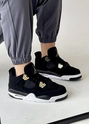Крутейшие женские унисекс кроссовки nike air jordan 13 VARSITY lucky green white 4 VARSITY black gold premium чёрные с золотом3 фото