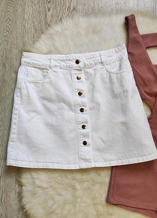 Белая плотная короткая джинсовая юбка мини трапеция с кнопками спереди карманами reserved3 фото