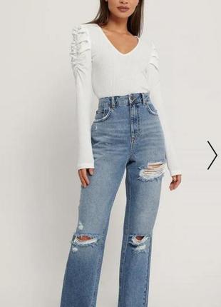 Модные джинсы с рваностями