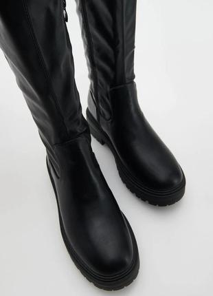 Ботфорти чоботи