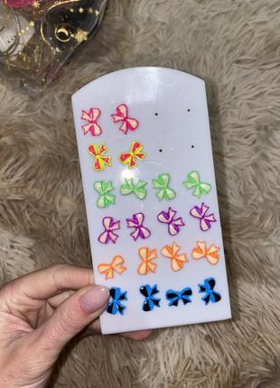 Серьги бантики