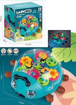 Музыкальная игрушка yj-3039 (30шт) жук,шестеренки,муз,свет,поворот360,бат-ке,в кор-ке,14,6-13,1-8см