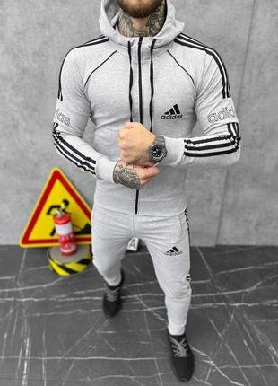 Чудовий чоловічий спортивний костюм adidas terrex light grey світло-сірий з чорними смужками та лого