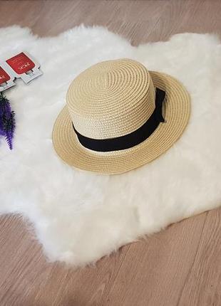 Солнцезащитная соломенная летняя шляпа канотье с бантиком1 фото