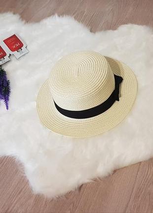 Солнцезащитная соломенная летняя женская шляпа канотье с бантиком1 фото