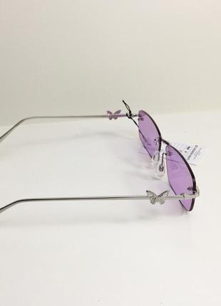 Солнцезащитные очки prettylittlething lilac lens frameless butterfly6 фото
