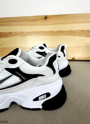 Жіночі білі кросівки в стилі бренда nike7 фото