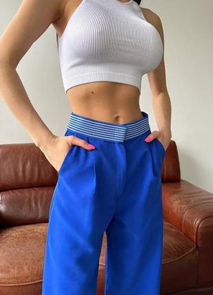 Эффектные женские брюки разные цвета