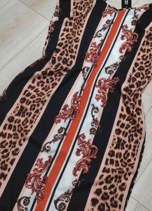 Новое платье миди в леопардовую полоску,размер м-л.3 фото