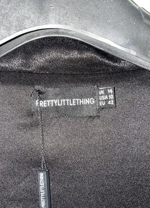 Чорний бархатний комбінезон з глибоким декольте в паєтках plt6 фото