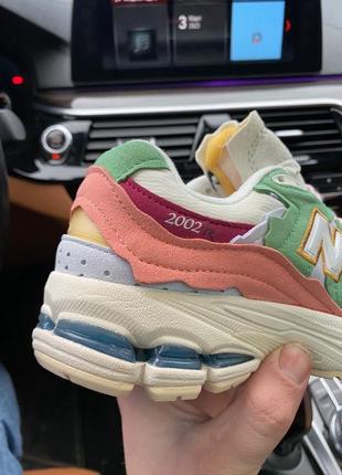 Красивейшие женские кроссовки new balance 2002r multicoloured пудровые с молочным цветные4 фото