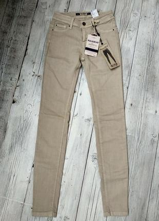 Бежеві штани скіні