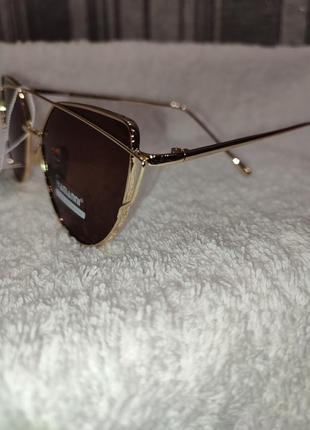 Солнцезащитные очки в металлической оправе yamanni3 фото