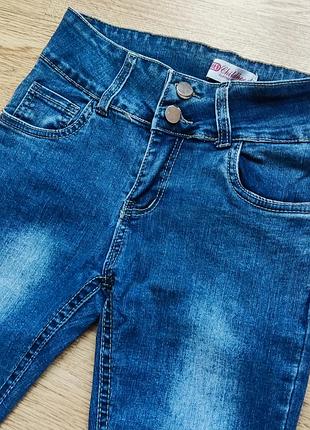 Джинсы на 10-12л.