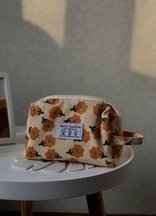 Косметичка з квітковим принтом з тканини