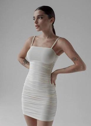 Неймовірно тендітна сукня міні на бретельках9 фото