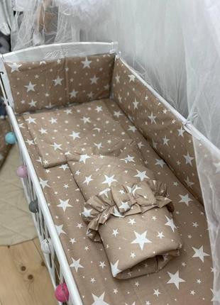 Комплект ліжка в дитячій ліжечці з бортиками1 фото