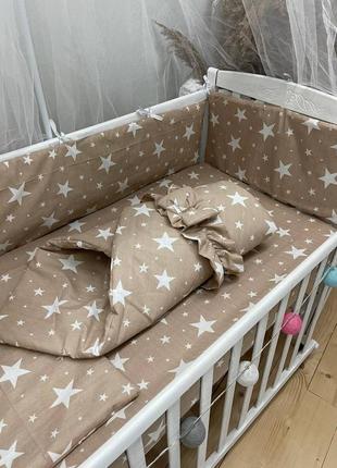 Комплект ліжка в дитячій ліжечці з бортиками4 фото