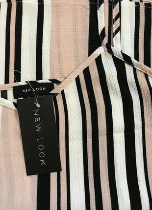 Очень красивая и стильная брендовая блузка-маечка в полоску.1 фото