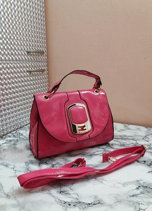 Оригинальная яркая сумочка розовая