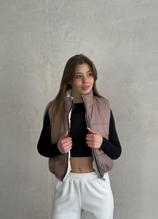 Стильна двостороння жилетка