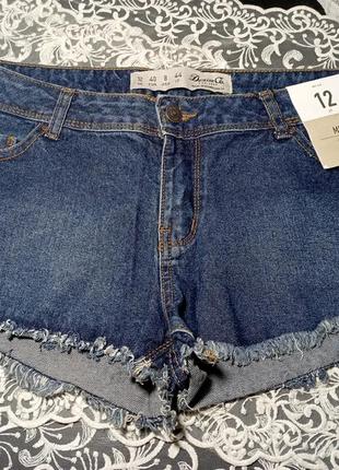 Шорти джинсові з бахромою для жінок темно-син denim co1 фото