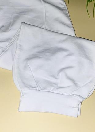 Спортивные штаны трехнитказ карманами, декорированы камушками. 1/ размер: 14 лет.3 фото