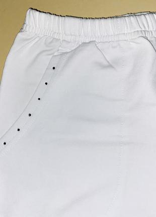 Спортивные штаны трехнитказ карманами, декорированы камушками. 1/ размер: 14 лет.8 фото
