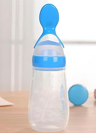 Бутылочка с ложкой силиконовая для кормления 125 мл голубая blpl09