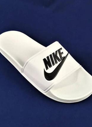 Чоловічі білі шльопанці nike сланці5 фото
