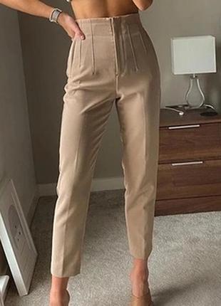 Вільні штани бежеві брюки mango джогери на резинці жіночі стильні молодіжні актуальні у діловому стилі з підворотами1 фото