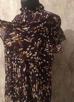 Блузка с воланом