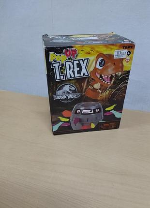 Tomy jurassic world pop up t-rex dinosaur game для дітей