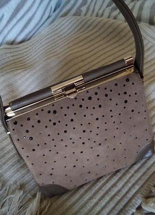 Красивий, шкіряний клач - коробка.